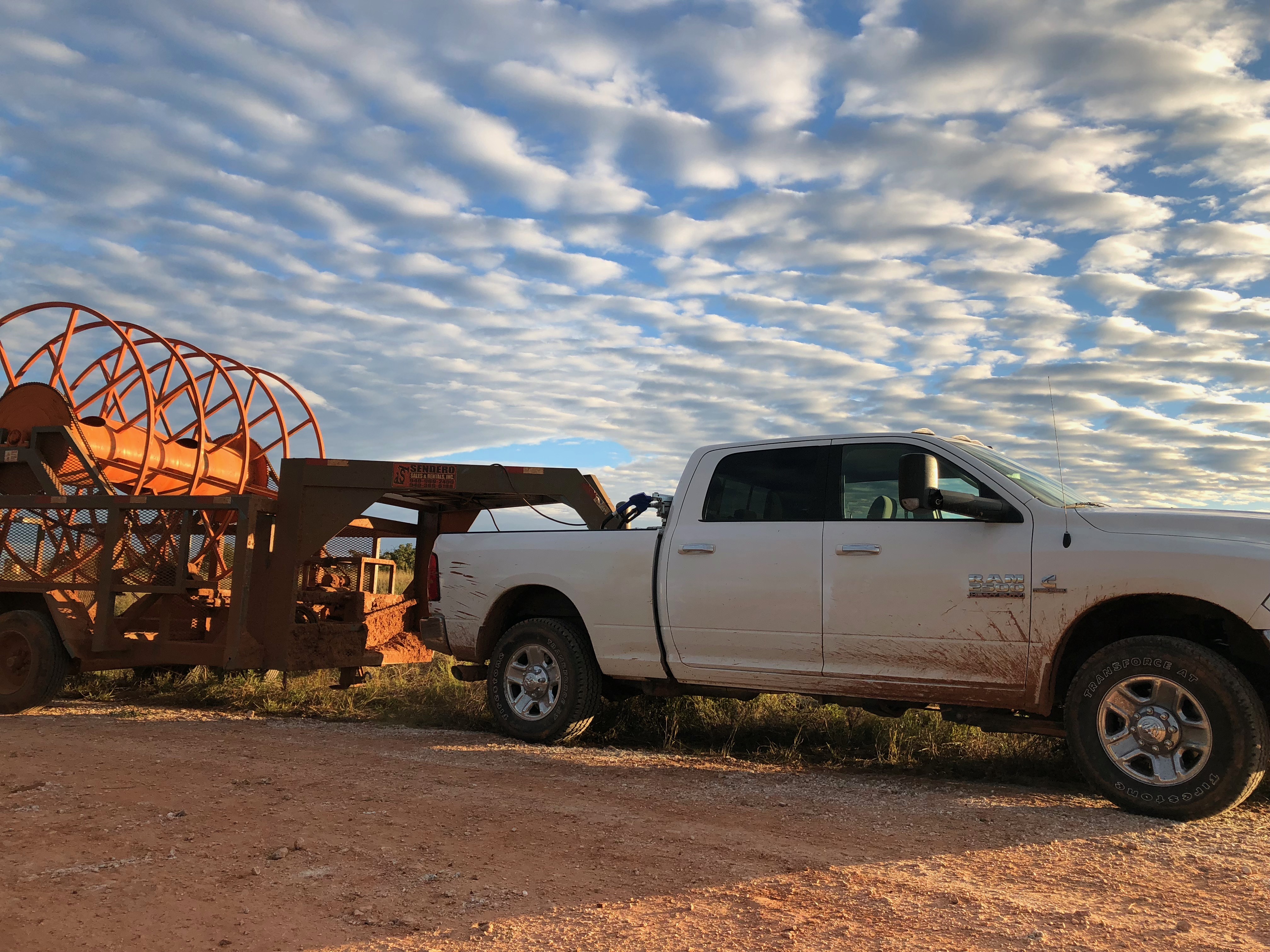 K & J truck hauling layflat reels